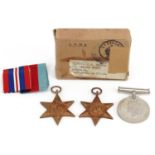 British military World War II three medal group with box of issue awarded FG/OFF.C.F.KIRBY, Cape