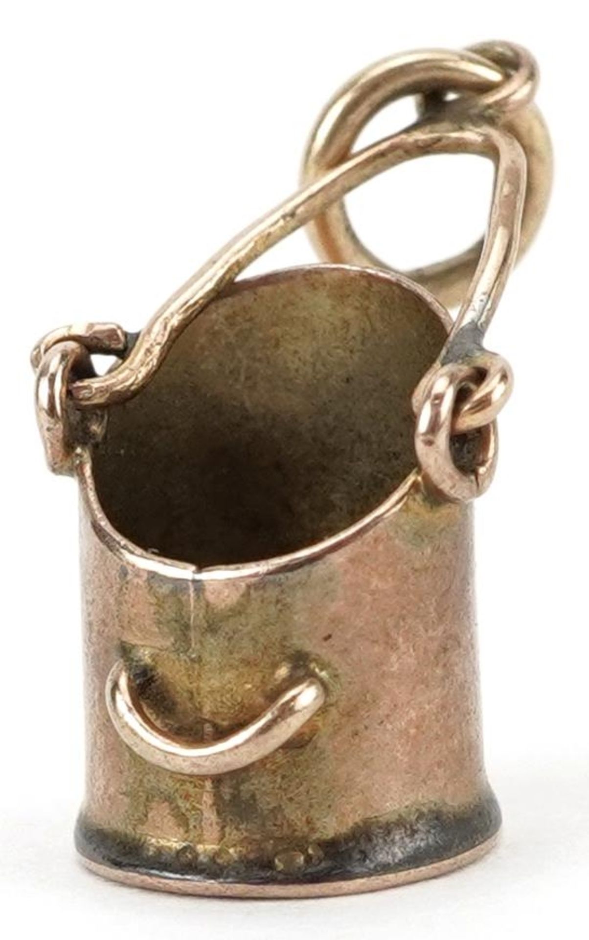 9ct gold charm in the form of a coal bucket with swing handle, 1.8cm high, 0.9g