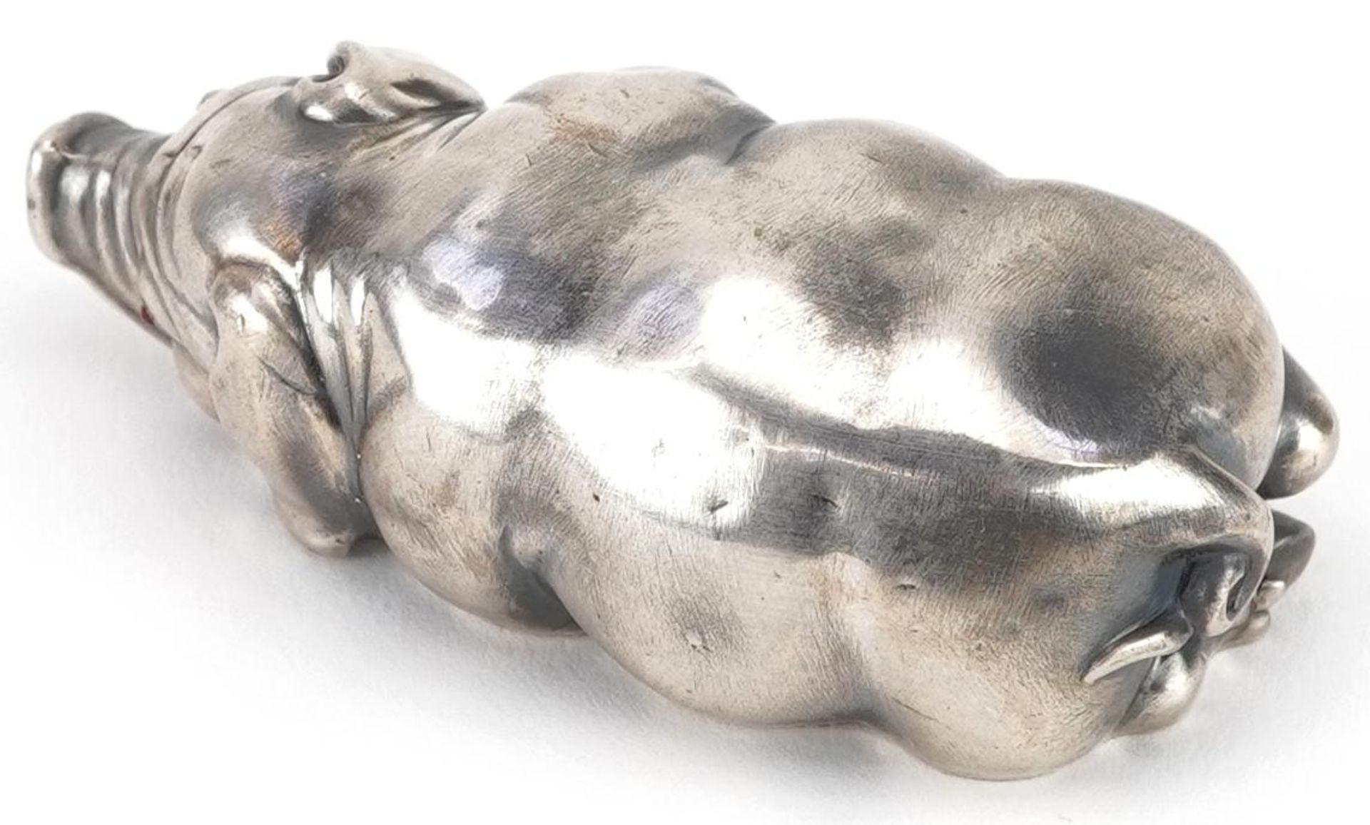 Silver recumbent pig with cabochon ruby eyes, impressed Russian marks to the base, 7cm in length, - Image 2 of 4