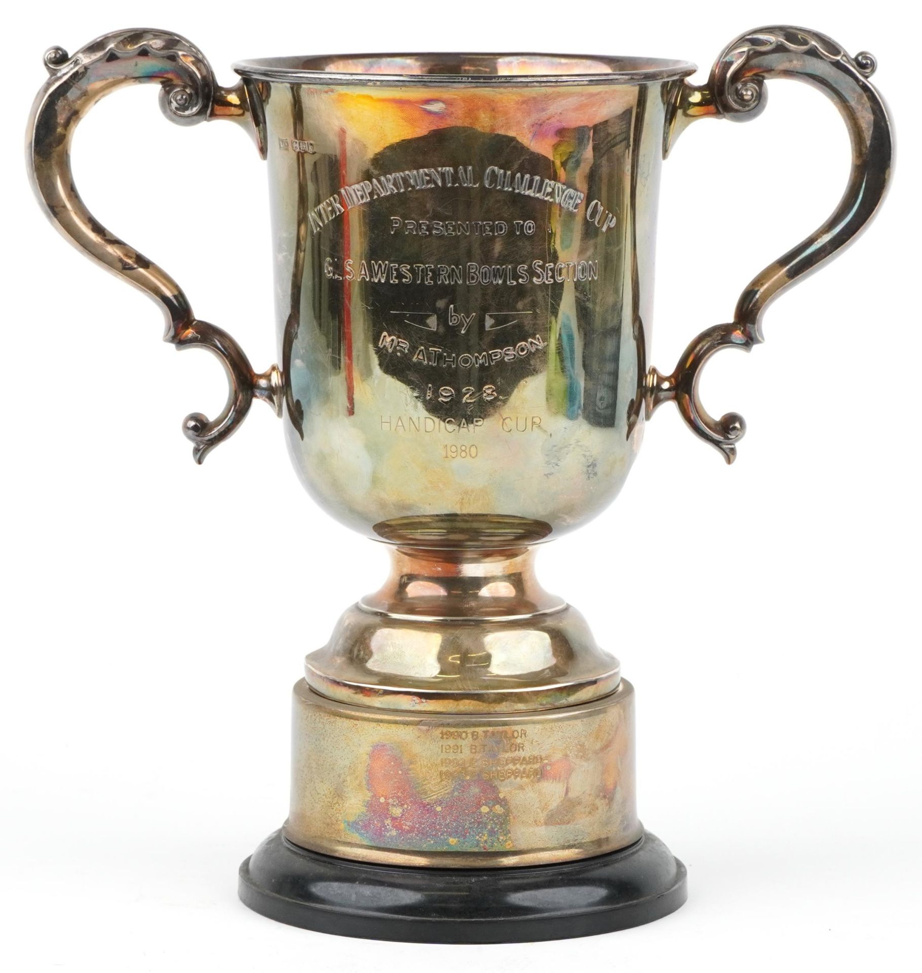 Walker & Hall, George V bowling interest silver trophy with twin handles on stand presented to G L S