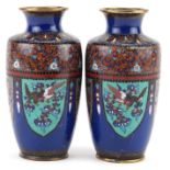 Pair of Japanese cloisonne vases enamelled with panels of stylised dragons and birds of paradise,