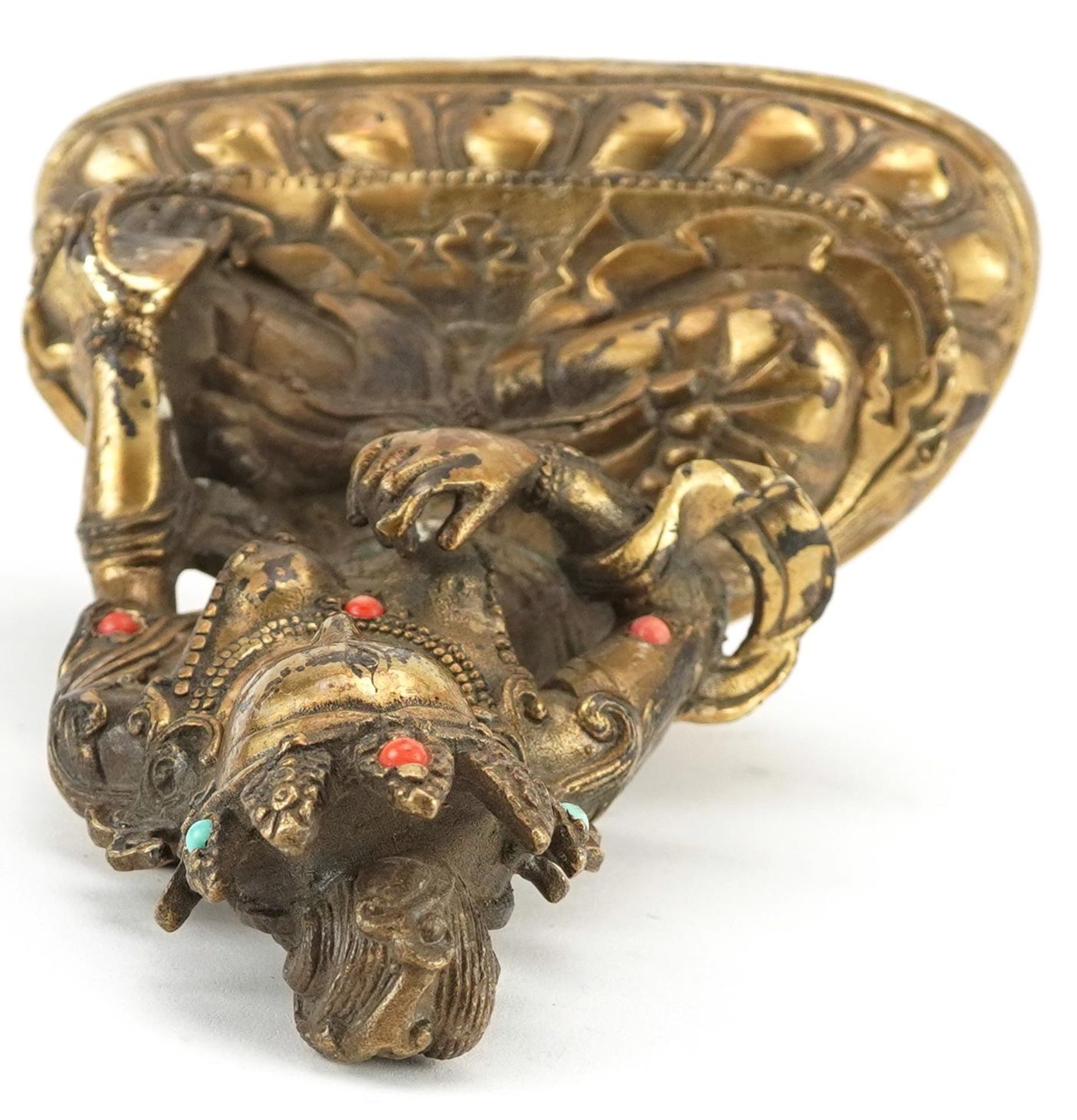 Chino Tibetan patinated bronze figure of seated Buddha with cabochons, character marks to the - Image 6 of 7