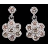 Pair of 18ct white gold round brilliant cut diamond flower head drop earrings, total diamond