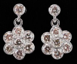 Pair of 18ct white gold round brilliant cut diamond flower head drop earrings, total diamond