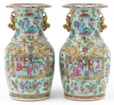 Pair of Chinese Canton porcelain vases with animalia twin handles finely hand painted in the famille