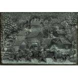 Thai white metal plaque profusely decorated in relief with figures before a village, mounted and
