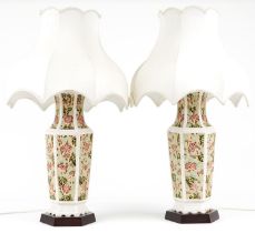 Large pair of Chinese hexagonal vase table lamps raised on hardwood stands with silk lined shades,