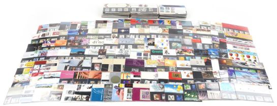 Extensive collection of Royal Mint presentation packs, various genres and denominations