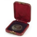 19th century white metal medallion with bust of Leo Pont housed in a silk and velvet lined fitted