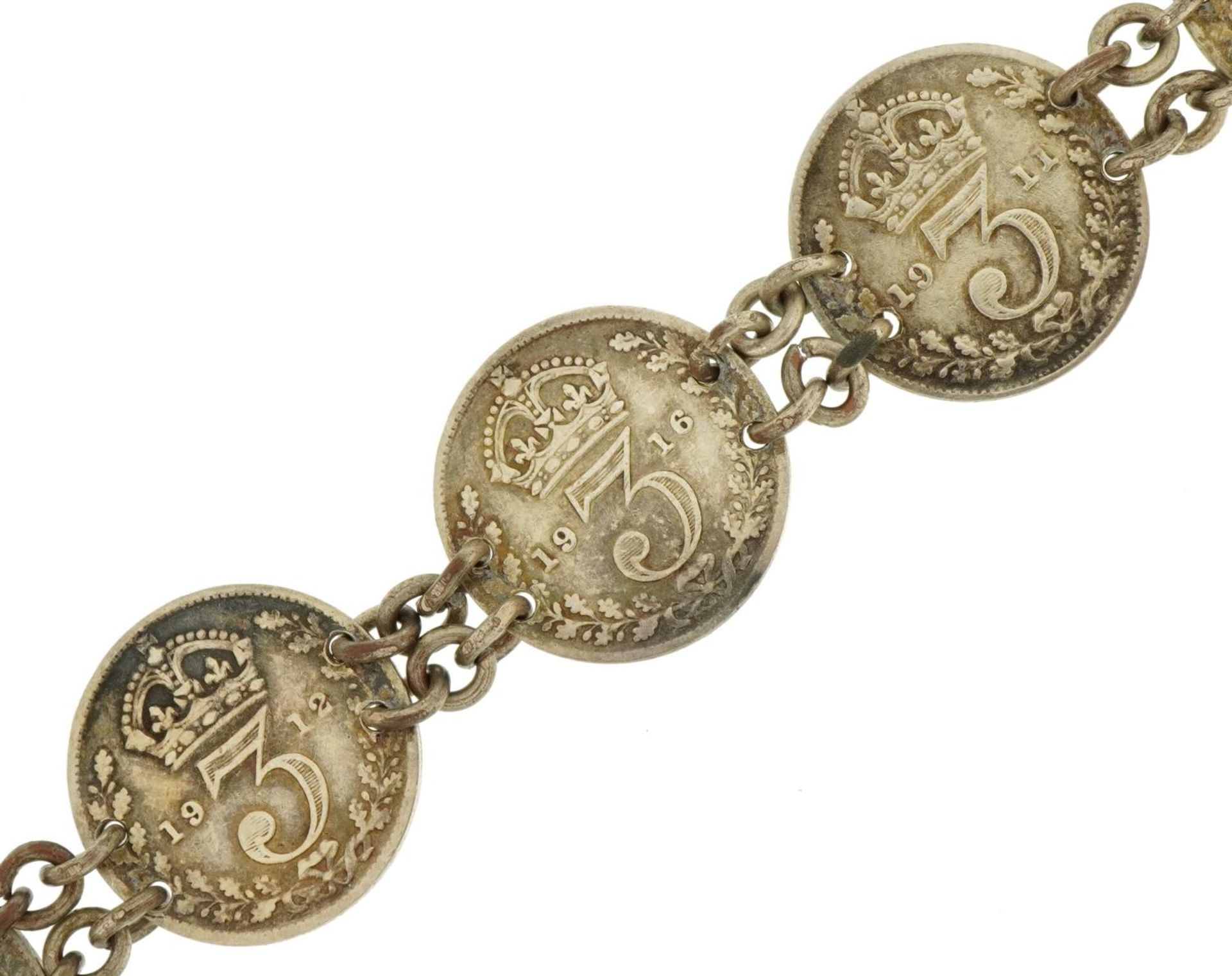 George V threepence coin bracelet with various dates including 1915, 1916 and 1937, 14.6g