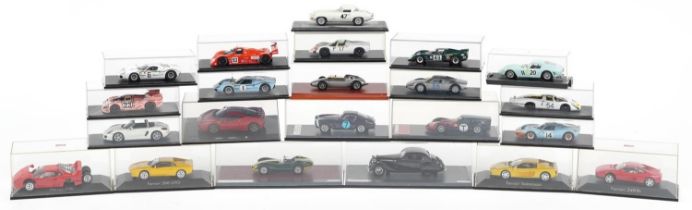 1:43 scale diecast model racing vehicles, predominantly with display cases, including Fujima Ferrari