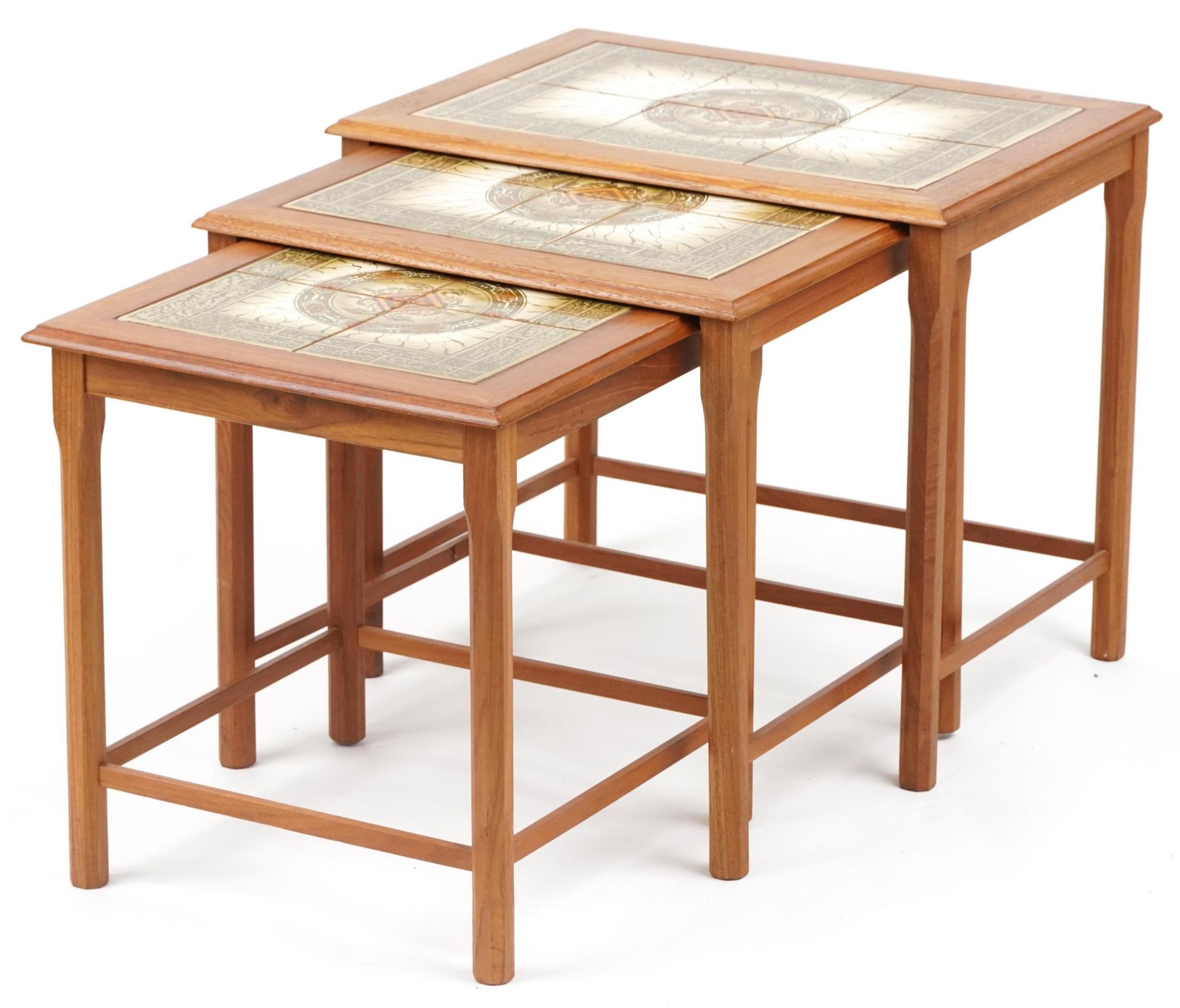 Nest of three mid century Danish teak occasional tables with inset tiled tops, the largest 48cm H