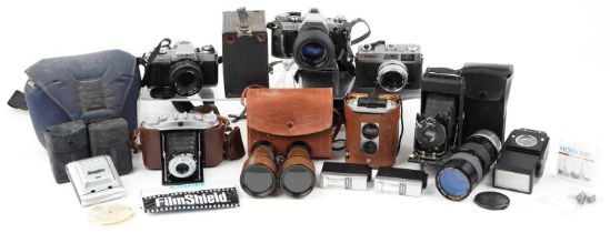 Vintage and later cameras and accessories including Minolta X-300, Canon AE-1 and Kodak Brownie no