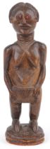 African carved hardwood fertility figure of a nude female, 39.5cm high