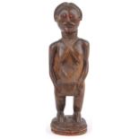 African carved hardwood fertility figure of a nude female, 39.5cm high