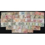 Collection of British and world banknotes including Elizabeth II one pounds and United States of