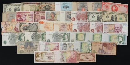 Collection of British and world banknotes including Elizabeth II one pounds and United States of