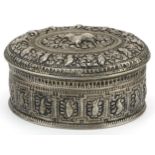 Anglo Indian white metal box and cover profusely embossed and engraved with wild animals and