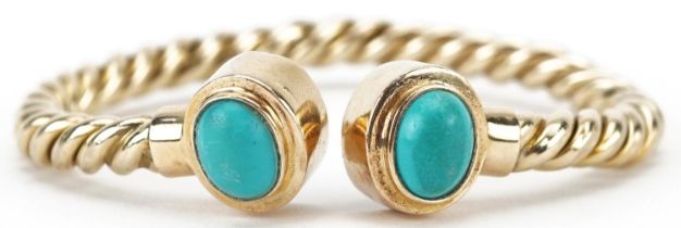 Unmarked gold rope twist and cabochon turquoise bangle, tests as 15ct gold, 6.5cm wide, 13.5g