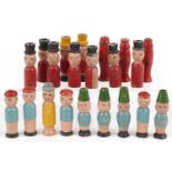 Collection of hand painted carved wood figural whistles, approximately 6.5cm in length