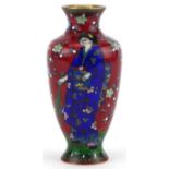 Japanese cloisonne vase enamelled with a Geisha in a landscape with flowers, 13.5cm high