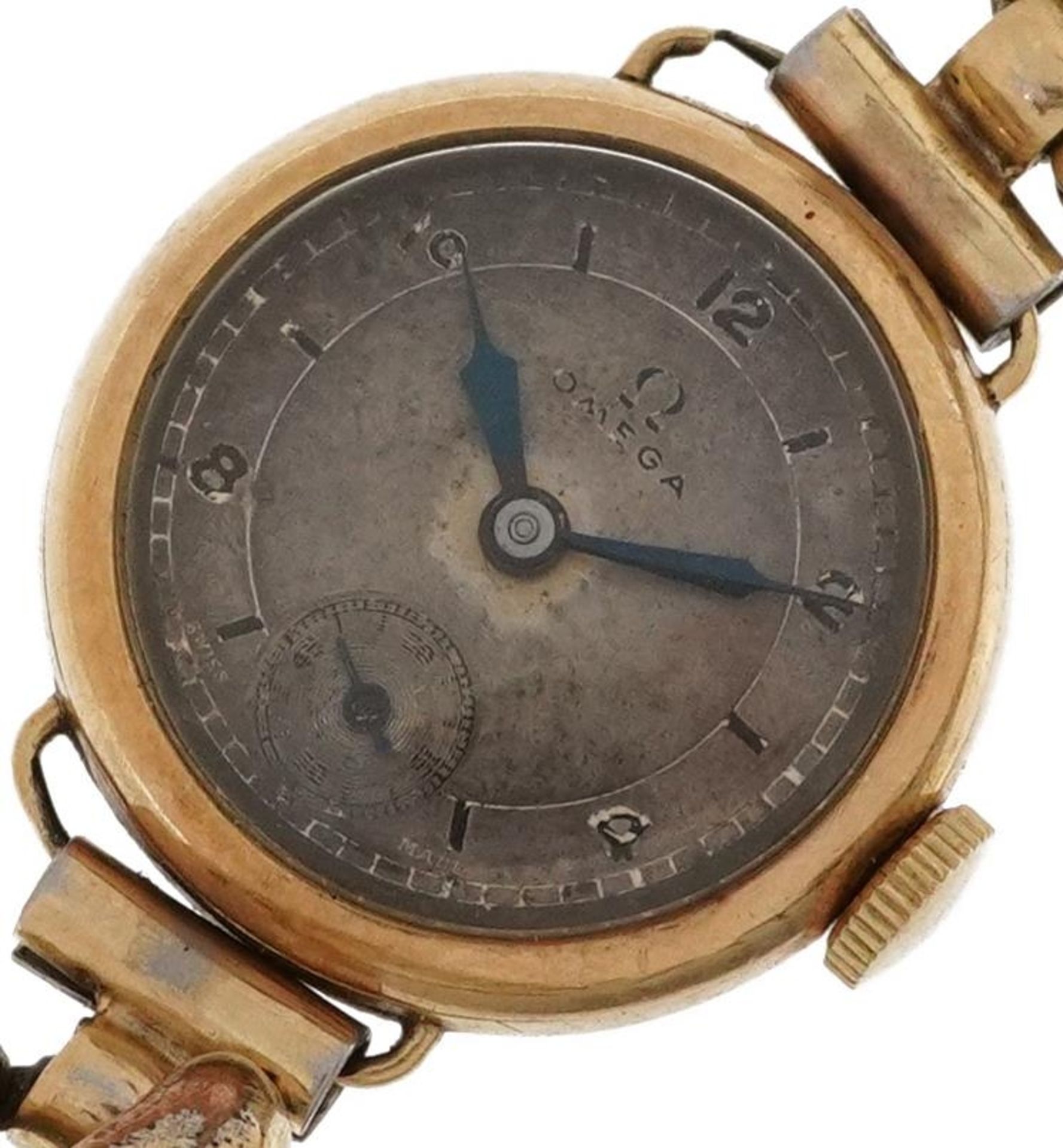 Omega, ladies 14ct gold manual wind wristwatch on a gold plated strap having silvered and subsidiary