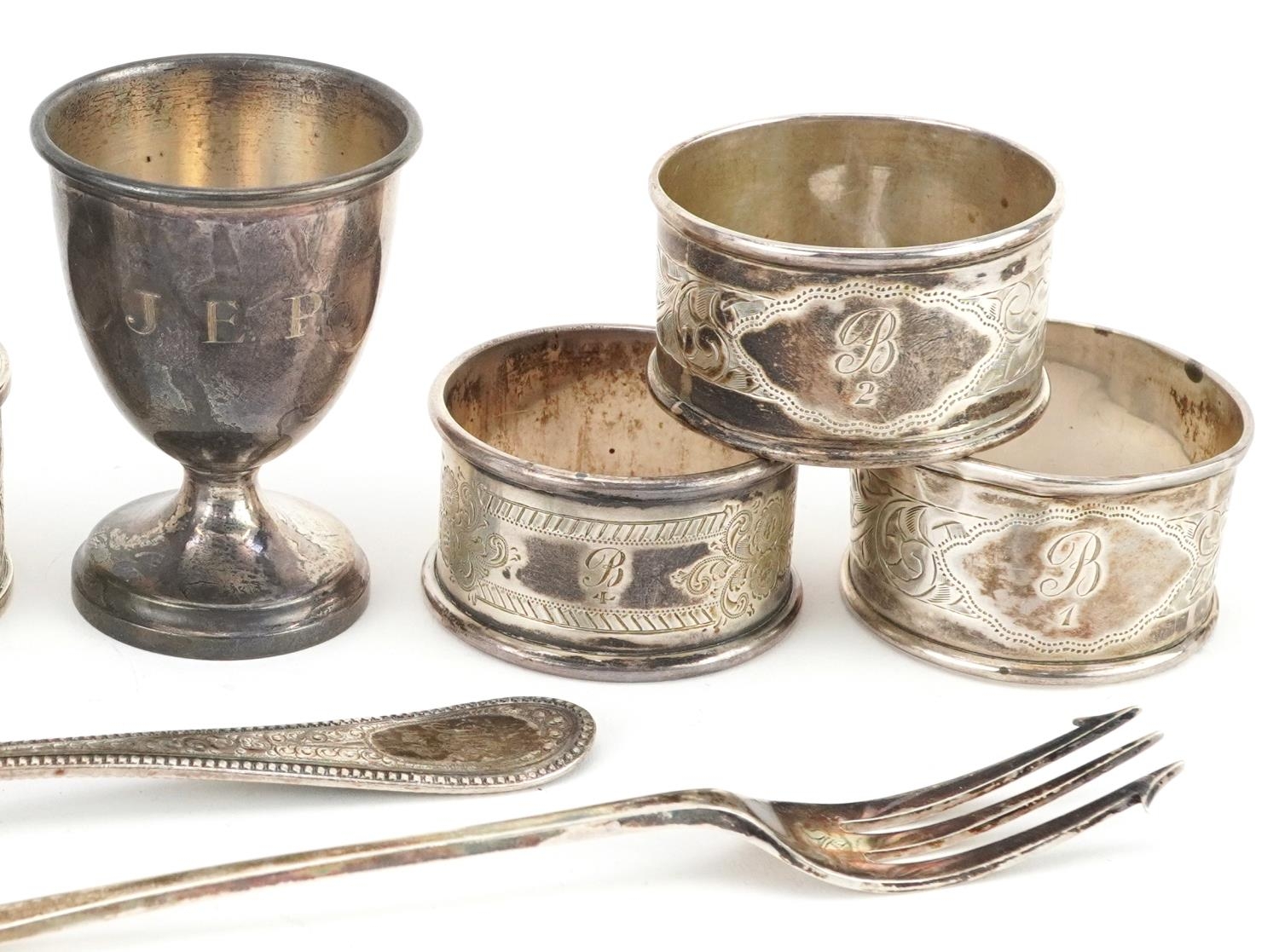 Victorian and later silver comprising six napkin rings, eggcup, pickle fork and tablespoon, the - Image 2 of 8