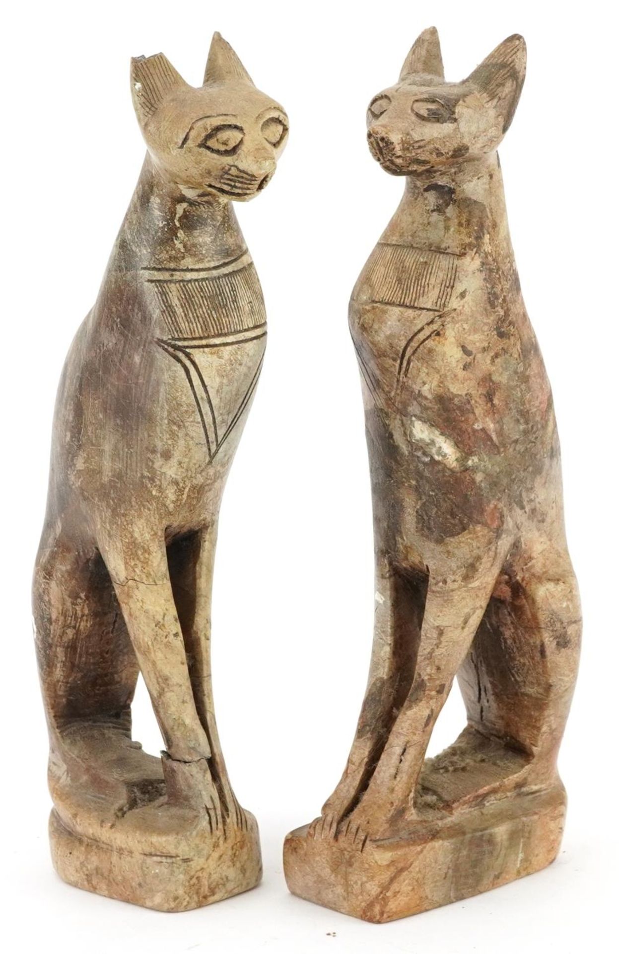 Pair of Egyptian carved stone Bastet cats, each 25cm high