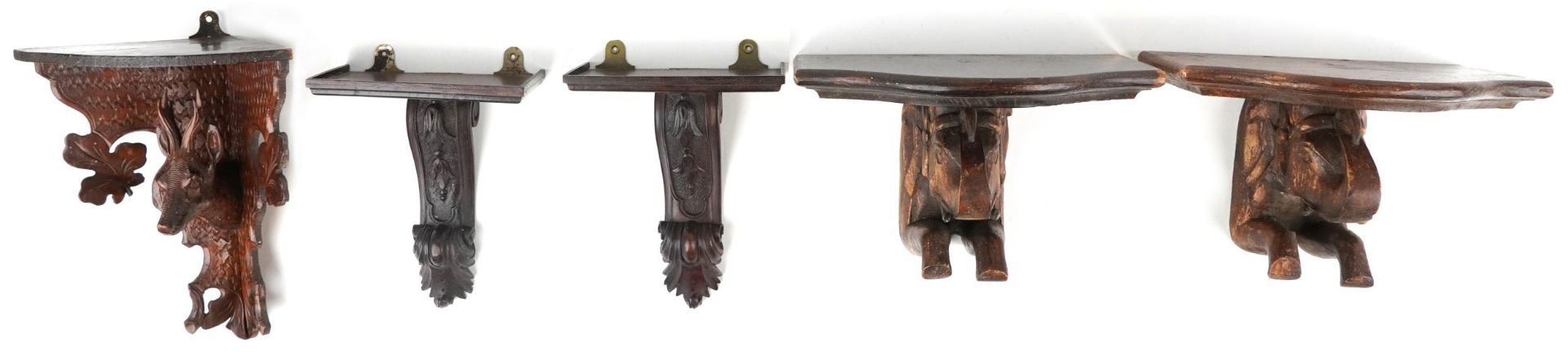 19th century and later treen wall brackets including a German Black Forest example carved in