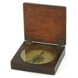 Early 19th century mahogany travelling compass with hinged lid, 8cm wide