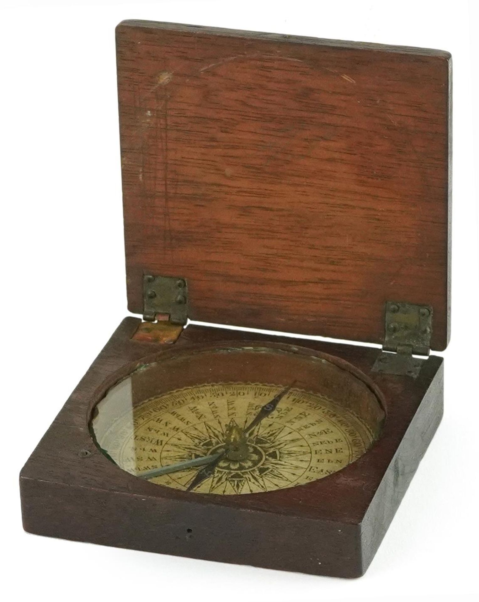 Early 19th century mahogany travelling compass with hinged lid, 8cm wide