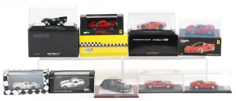 Nine 1:43 scale diecast model vehicles with cases/boxes, including Autoart Signature, Minichamps,
