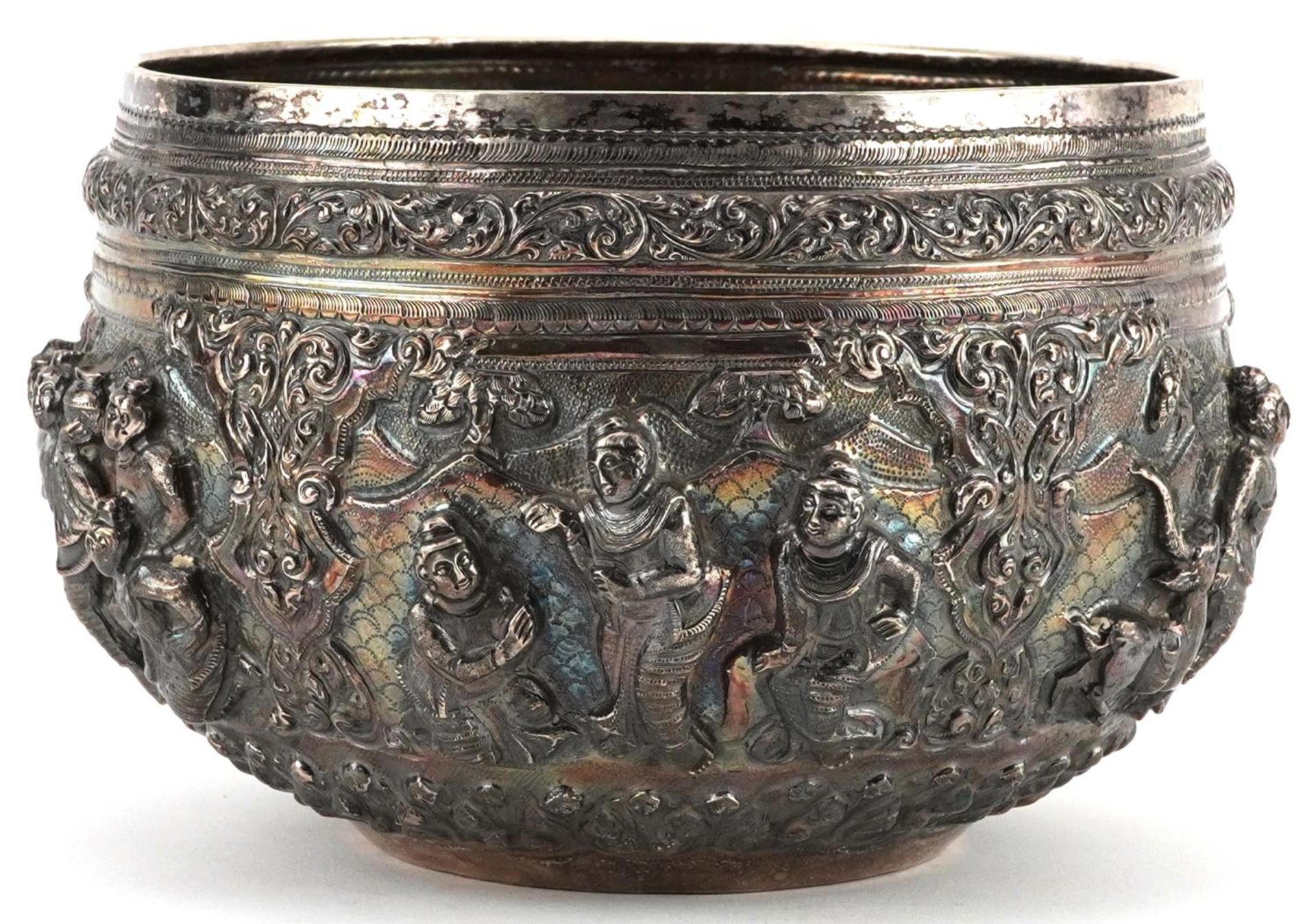 Burmese unmarked silver bowl profusely embossed with deities and animals within landscapes, 12cm - Image 3 of 10