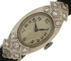 Art Deco platinum and diamond ladies manual wind cocktail watch having silvered dial with Arabic