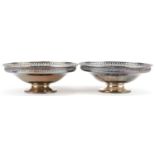 Elkington & Co, pair of George V circular silver bonbon dishes with pierced rims, Birmingham 1922,