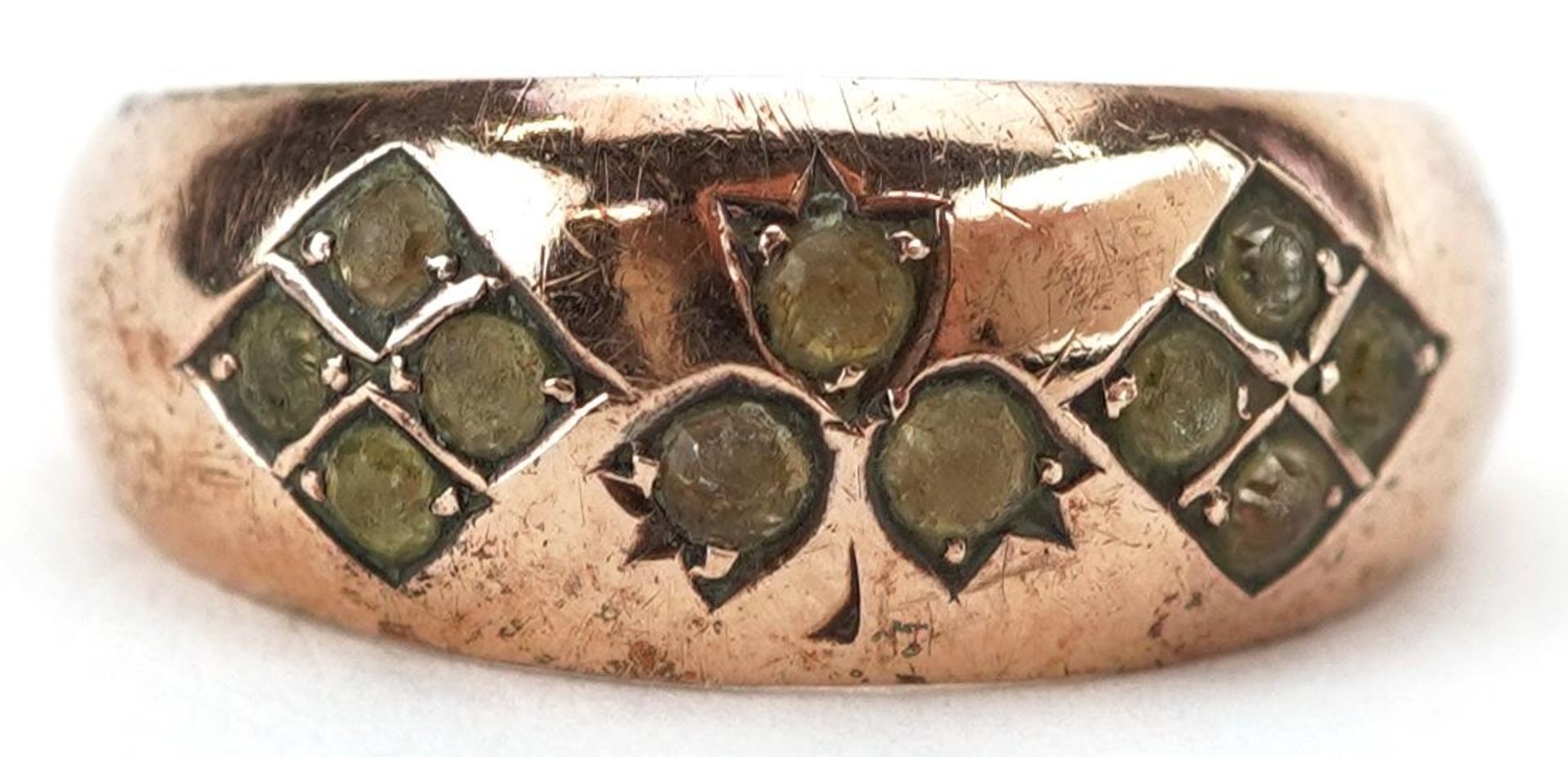 Edwardian 9ct rose gold green stone floral ring, Chester 1907, 2.0g