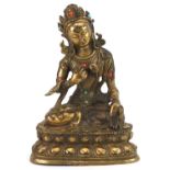 Chino Tibetan patinated bronze figure of seated Buddha with cabochons, character marks to the