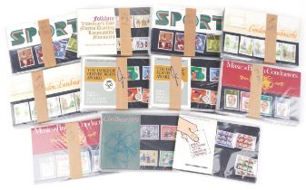 Collection of Royal Mint presentation packs, various genres and denominations