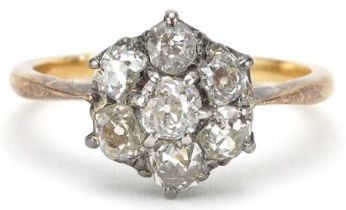 Antique unmarked gold diamond flower head ring, total diamond weight approximately 1.25 carat, tests