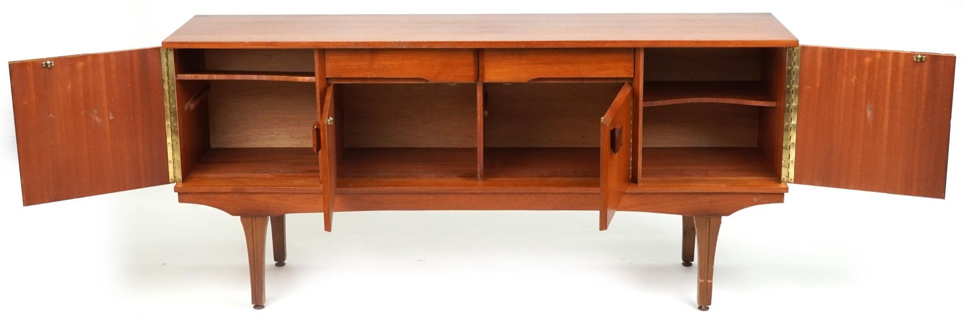 Mid century teak sideboard fitted with an arrangement of two drawers and four cupboard doors, 76cm H - Image 3 of 4