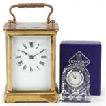 French brass cased carriage clock with enamelled dial having Roman numerals and an Edinburgh Crystal