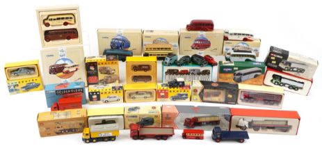 Diecast model vehicles with boxes including Corgi London Brick, Corgi Buses and Vanguards