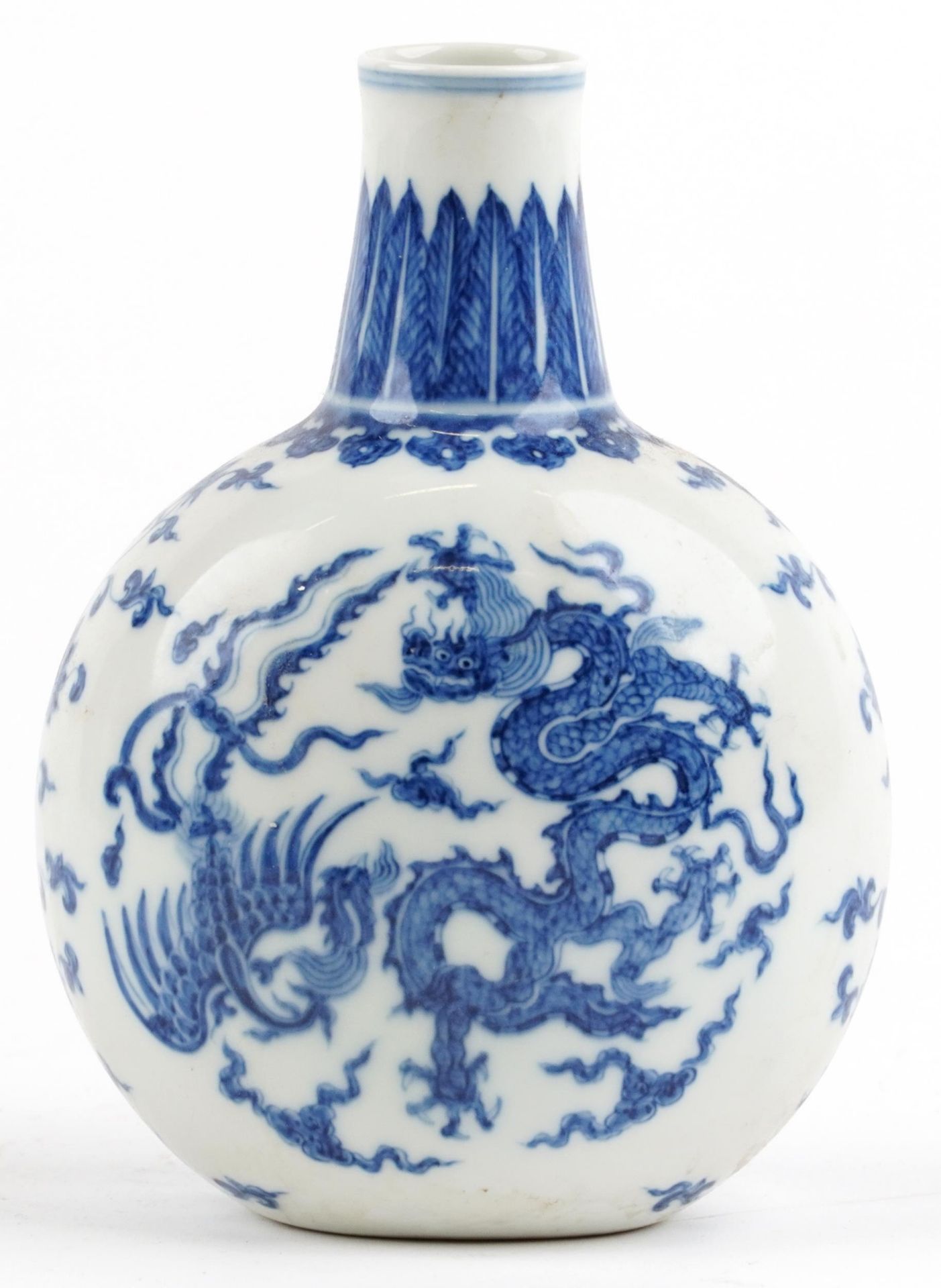 Chinese blue and white porcelain moon flask hand painted with stylised roundels of dragons chasing a