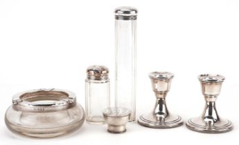 Edwardian and later silver objects including a pair of dwarf candlesticks, silver mounted glass