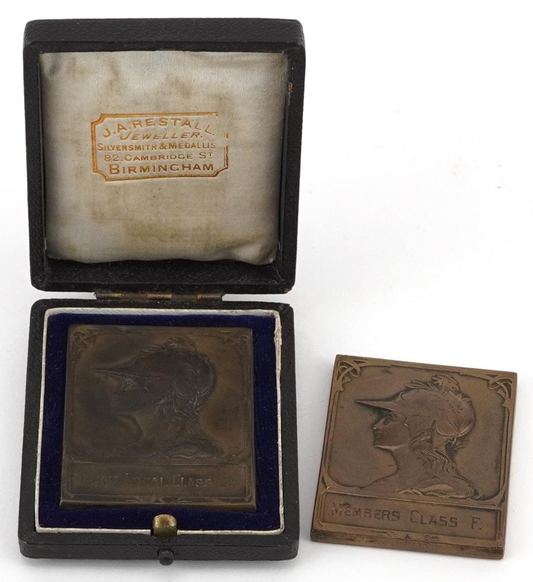 Two Art Nouveau Tunstall Photo Society bronzed medallions including one housed in a J A Restall