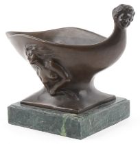 Art Nouveau style patinated bronze centrepiece cast in relief with nude male and female, raised on a