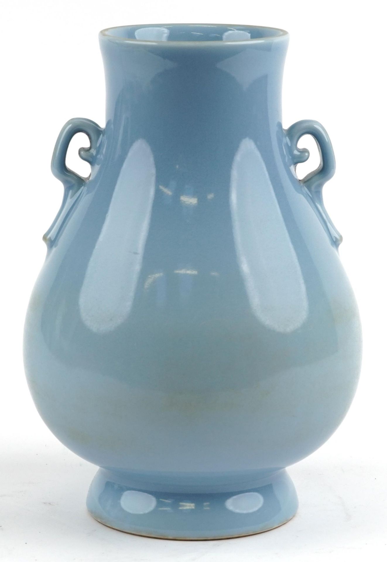 Large Chinese porcelain vase having a clair de lune type glaze with twin handles, six figure