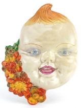 Clarice Cliff, Art Deco face mask in the form of a young red headed boy, 19.5cm high