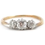 Unmarked gold diamond three stone ring, tests as 18ct gold, total diamond weight approximately 0.