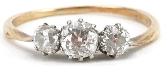 Unmarked gold diamond three stone ring, tests as 18ct gold, total diamond weight approximately 0.